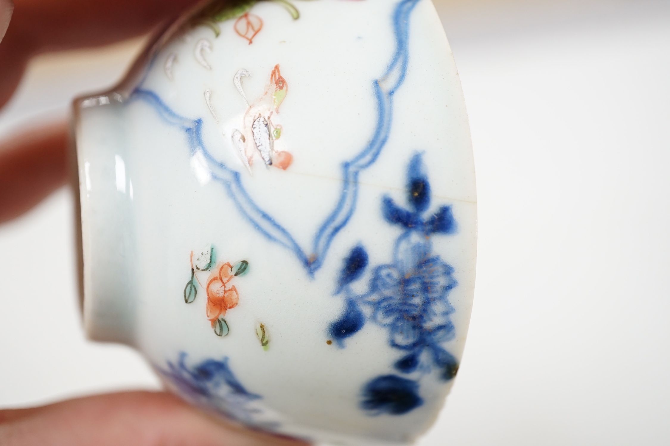 A Chinese famille rose cup and saucer, Qianlong period, saucer 12cm diameter